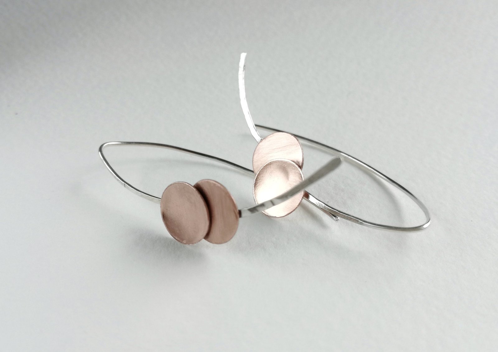 Pendientes de cobre y plata de ley