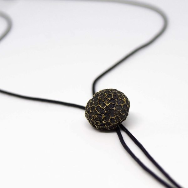 Colgante semilla de latón